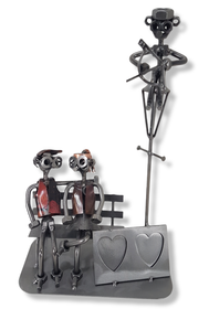 Metallinen taideteos (puiston penkki)