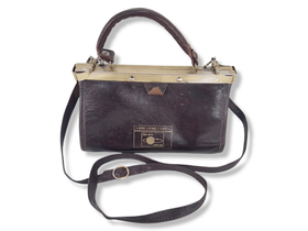 Vanha laukku (Paris-Roma-Tokyo)