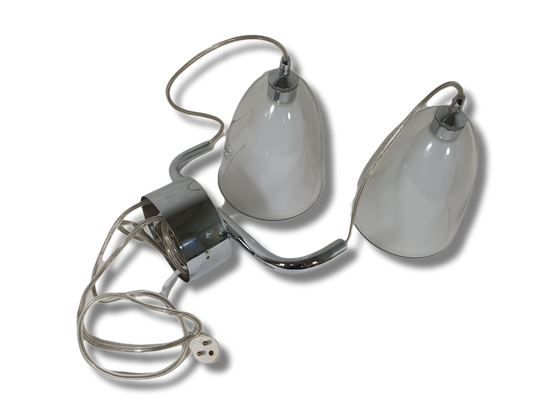 Kaksiosoinen kattovalaisin lasikuvuilla