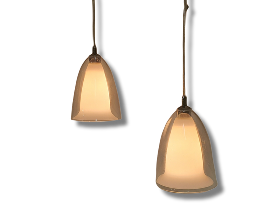 Kaksiosoinen kattovalaisin lasikuvuilla