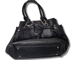 Käsilaukku (Pieces of you)