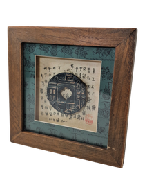 Kiinalainen kolikko kehystettynä