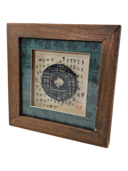 Kiinalainen kolikko kehystettynä