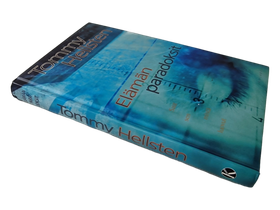 Kirja (Elämän paradoksit - Tommy Hellsten)