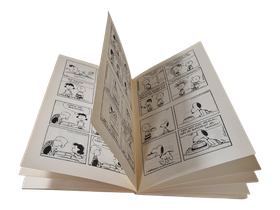 Kirja (Pelit seis, Jaska Jokunen : Uusi Tenavat -kirja - Charles M. Schulz)