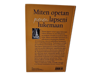 Kirja (Miten opetan pienen lapseni lukemaan - Glenn Doman)