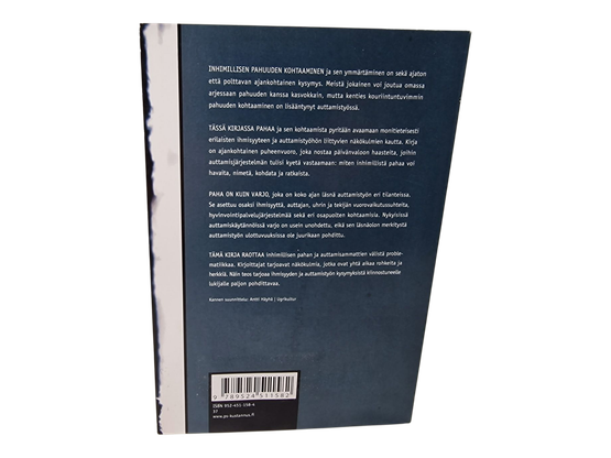 Kirja (Pahan kosketus : Ihmisyyden ja auttamistyön varjojen jäljillä - Merja Laitinen)