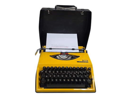 Keltainen vintage kirjoituskone (Tippa S)