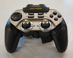 Playstation 1  -konsoli tarvikeohjaimella