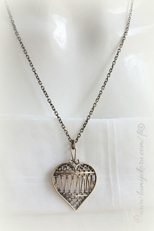 Sarpaneva sydänkoru pronssi