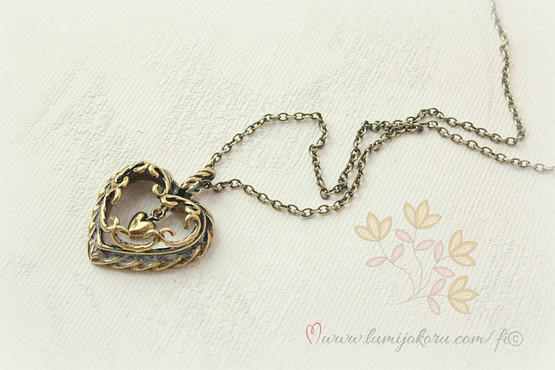 Kalevala Talon Sydän pronssi