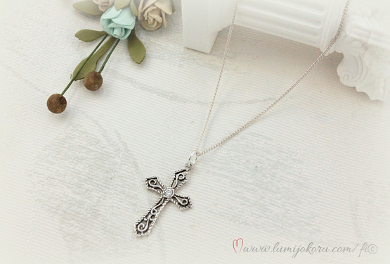 Hopeinen ristiriipus