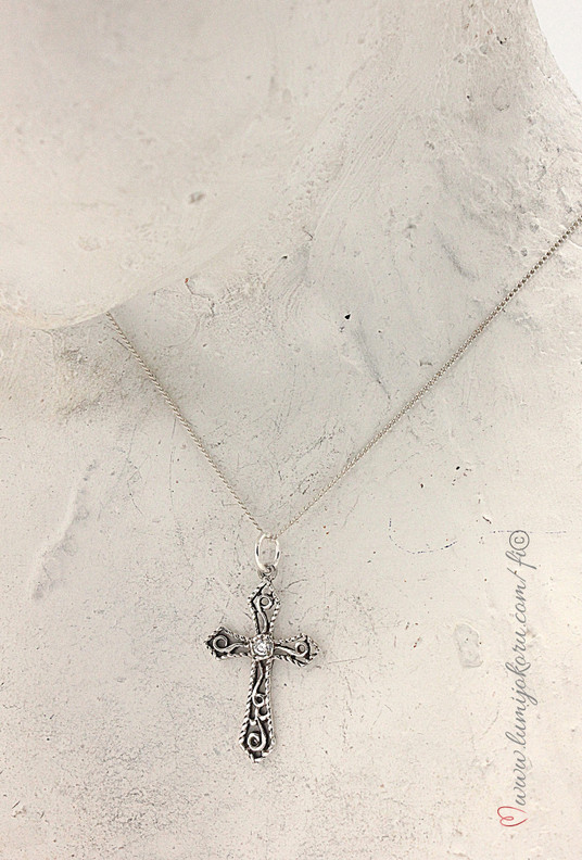 Hopeinen ristiriipus