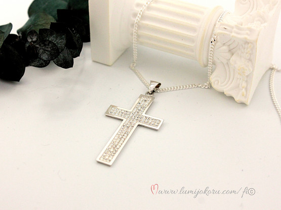 Iso ristiriipus hopeaa 