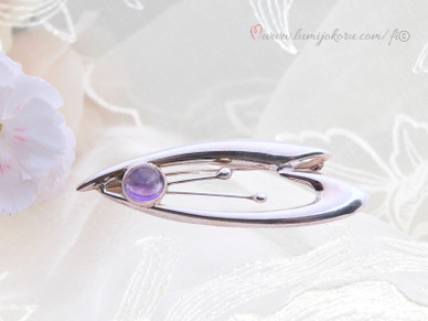 Rintakoru hopeaa ametistilla