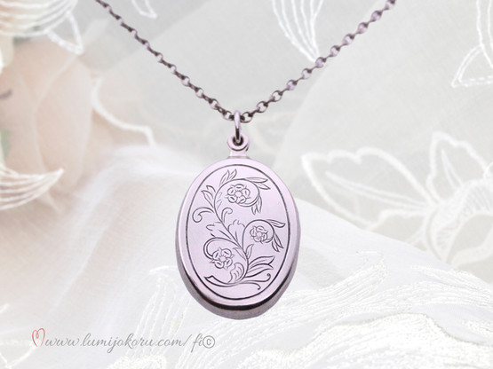 Medaljonki Lapista Kalevala koru hopeaa