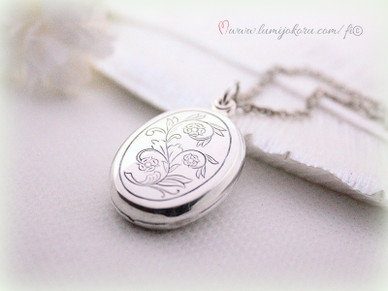 Medaljonki Lapista Kalevala koru hopeaa