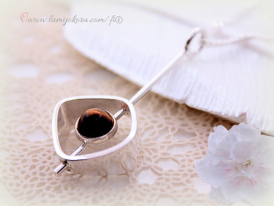 Elis Kauppi riipus tiikerinsilmällä