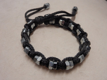 Musta ranneke tupla-mutterein