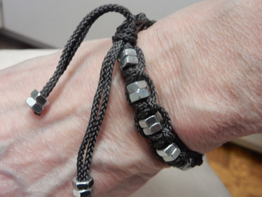 Musta ranneke tupla-mutterein