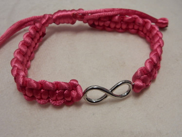 Vaaleanpunainen ranneke 