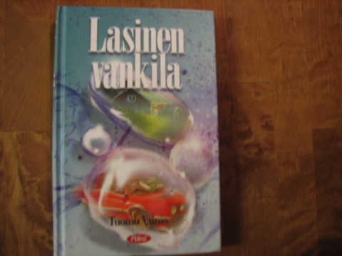 Lasinen vankila, Tuomo Vainio