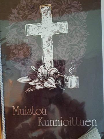 Suruadressi, risti mustalla pohjalla