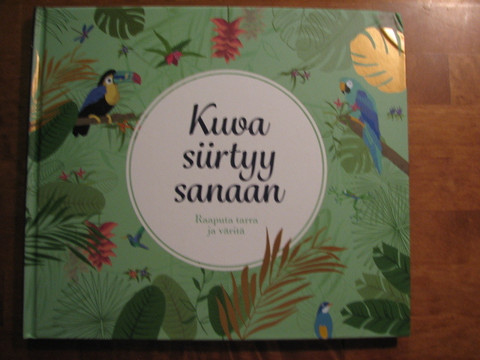 Kuva siirtyy sanaan, raaputa tarra ja väritä