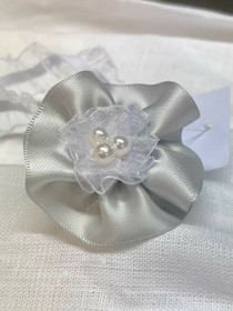 Kastepanta helmillä, hopea ruusuke