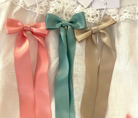 Klione - kastenauha rusetilla - lohenpunainen