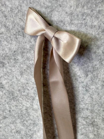 Klione - kastenauha rusetilla - hiekka