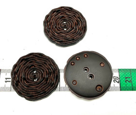 Jurmuinen/poimuinen nappi