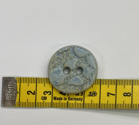 Keraaminen nappi: Pyöreä ,vaaleansininen