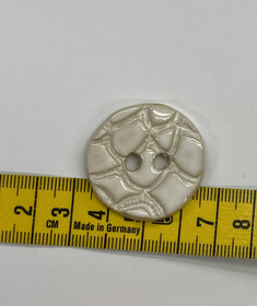 Keraaminen nappi: Valkoinen tiilikuvio