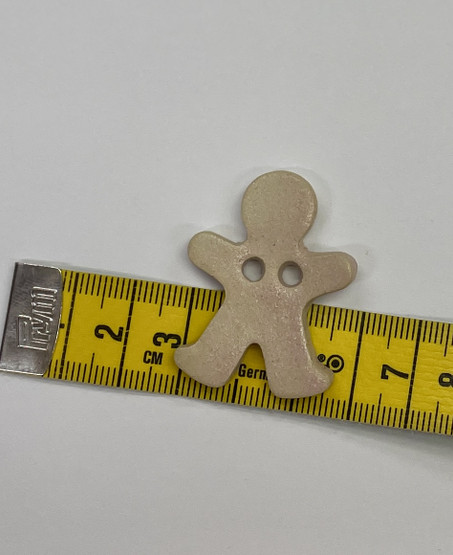 Keraaminen Nappi: ihminen