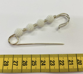 Koristehakaneula: Helmet