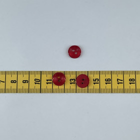 Punainen kiiltävä nappi