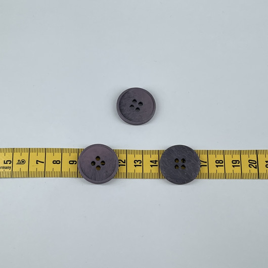 Harmaa violetti nappi