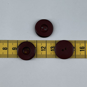 Punaruskea muovi nappi 