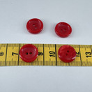 Kiiltävä punainen nappi