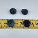 Tumman sininen kiiltävä nappi