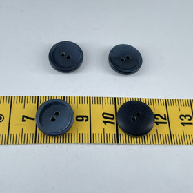 Tumman sininen kiiltävä nappi