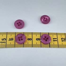 Läpi kuultava nappi