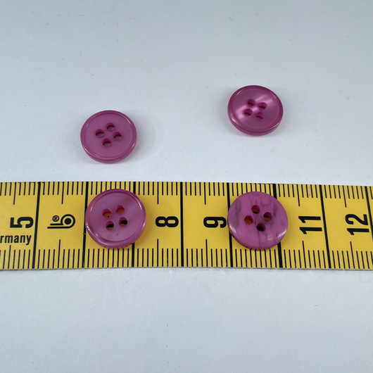 Läpi kuultava nappi