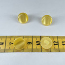 Kaareva kanta nappi kimalteella